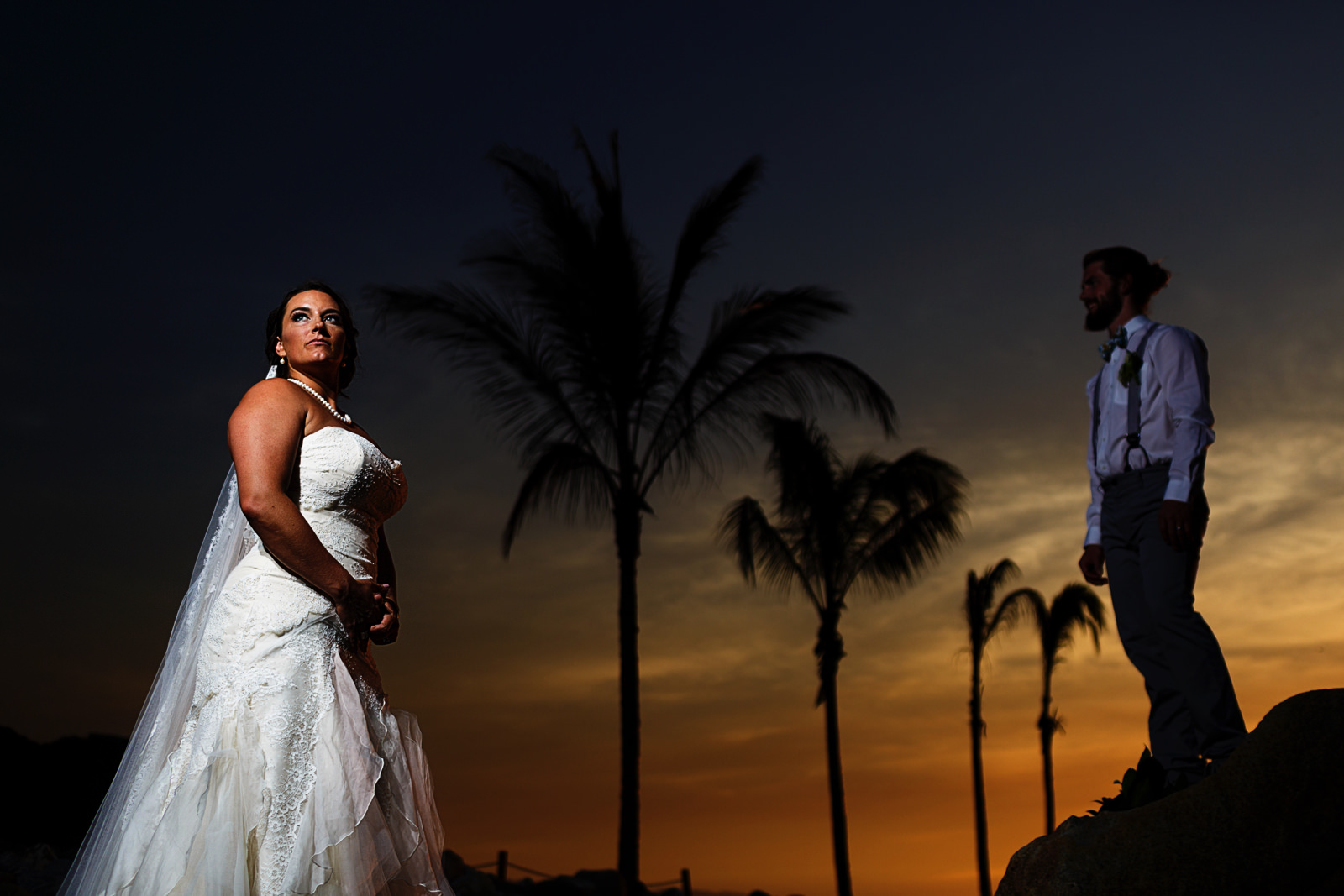 Groom-and-bride-portrait-sunset-palms