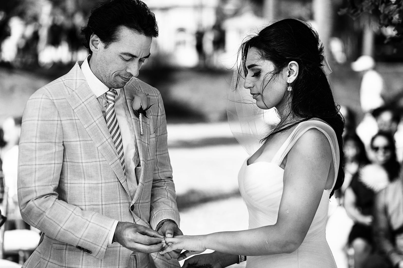 groom-placing-ring-onto-bride