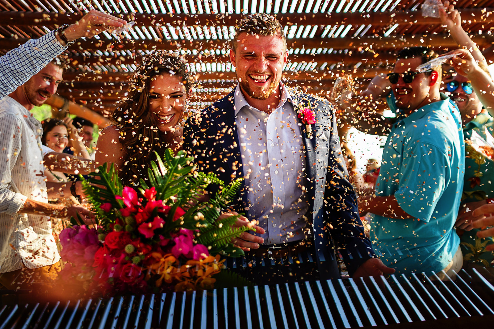 Exit of groom and bride with confetti