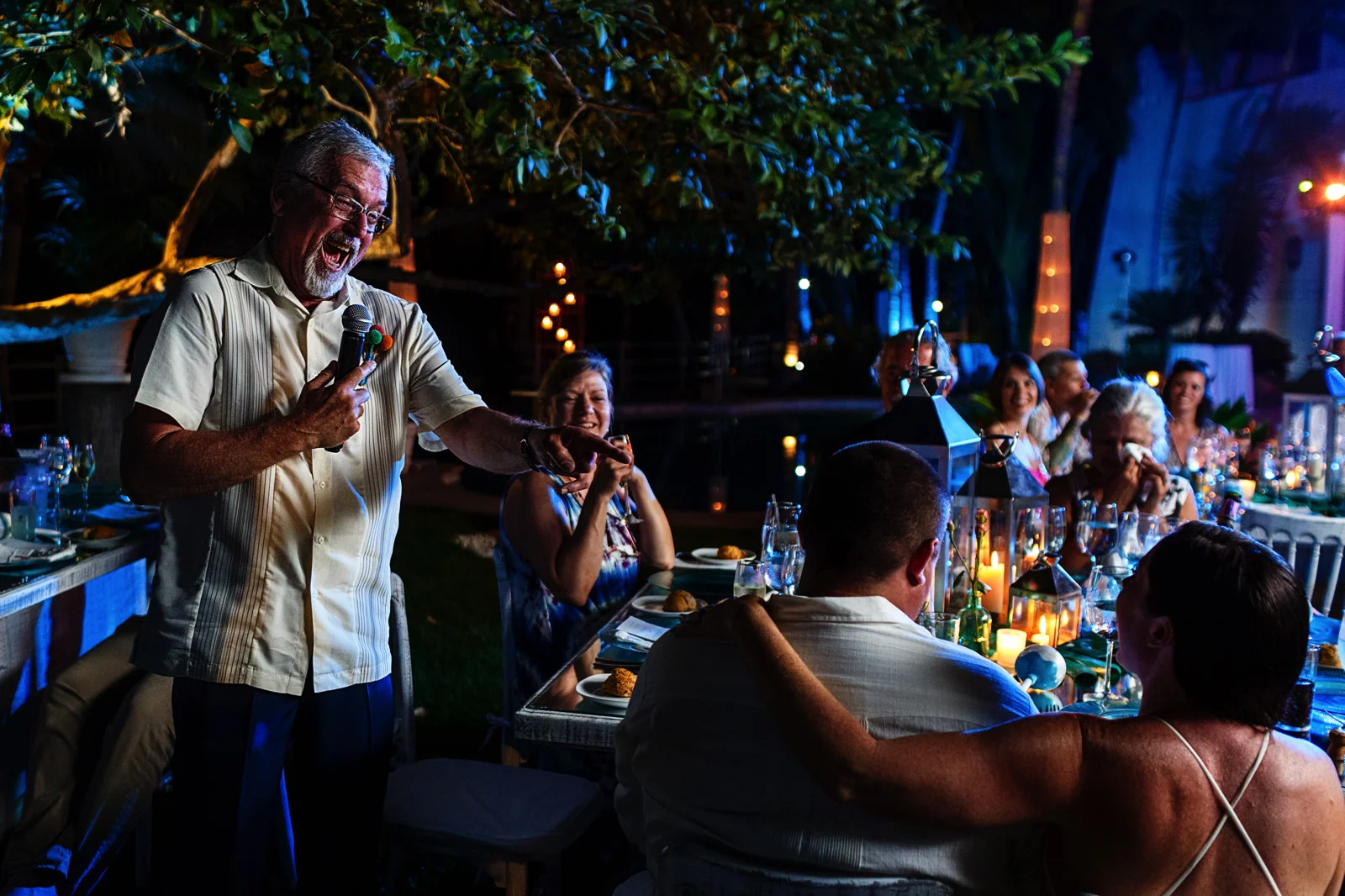 Father of the groom gives a speech during dinner