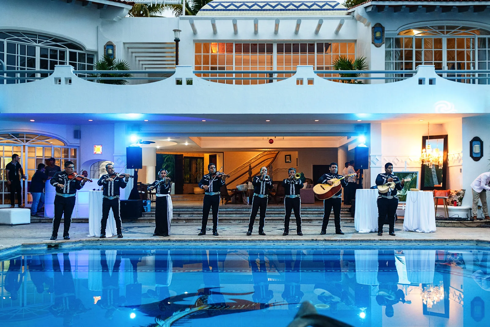 Mariachi band plays for all the wedding guests in the pool area at La Mansion Vallarta