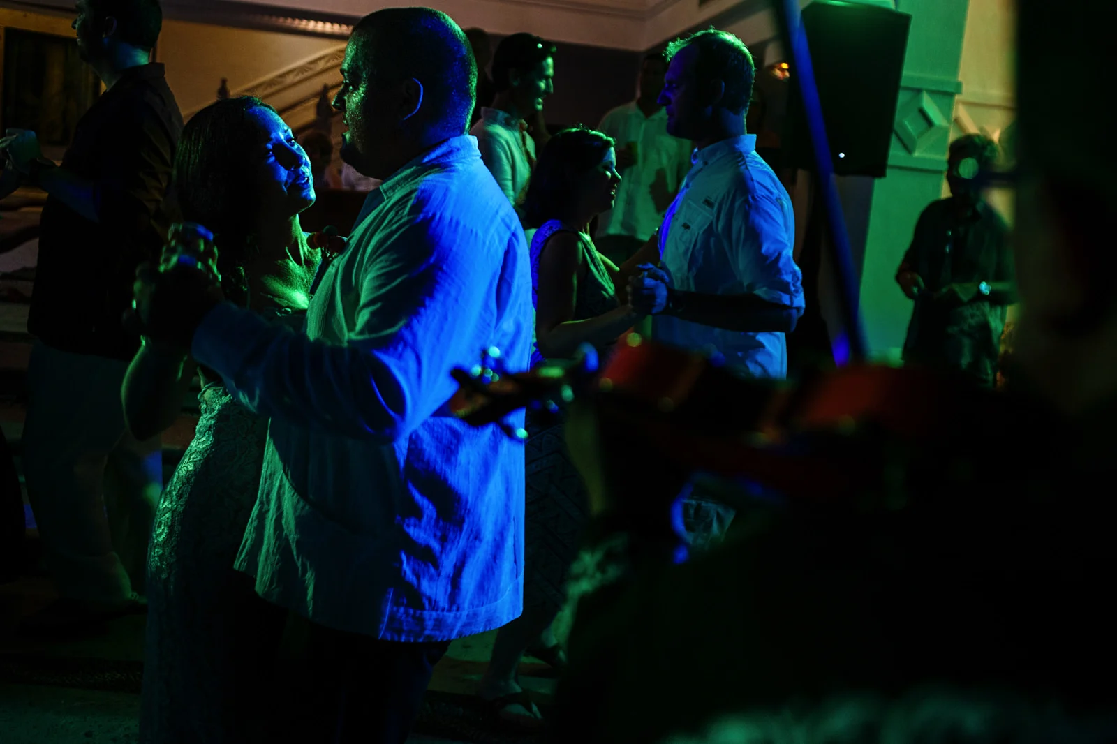 Groom and bride dancing between all their guests to the live mariachi music