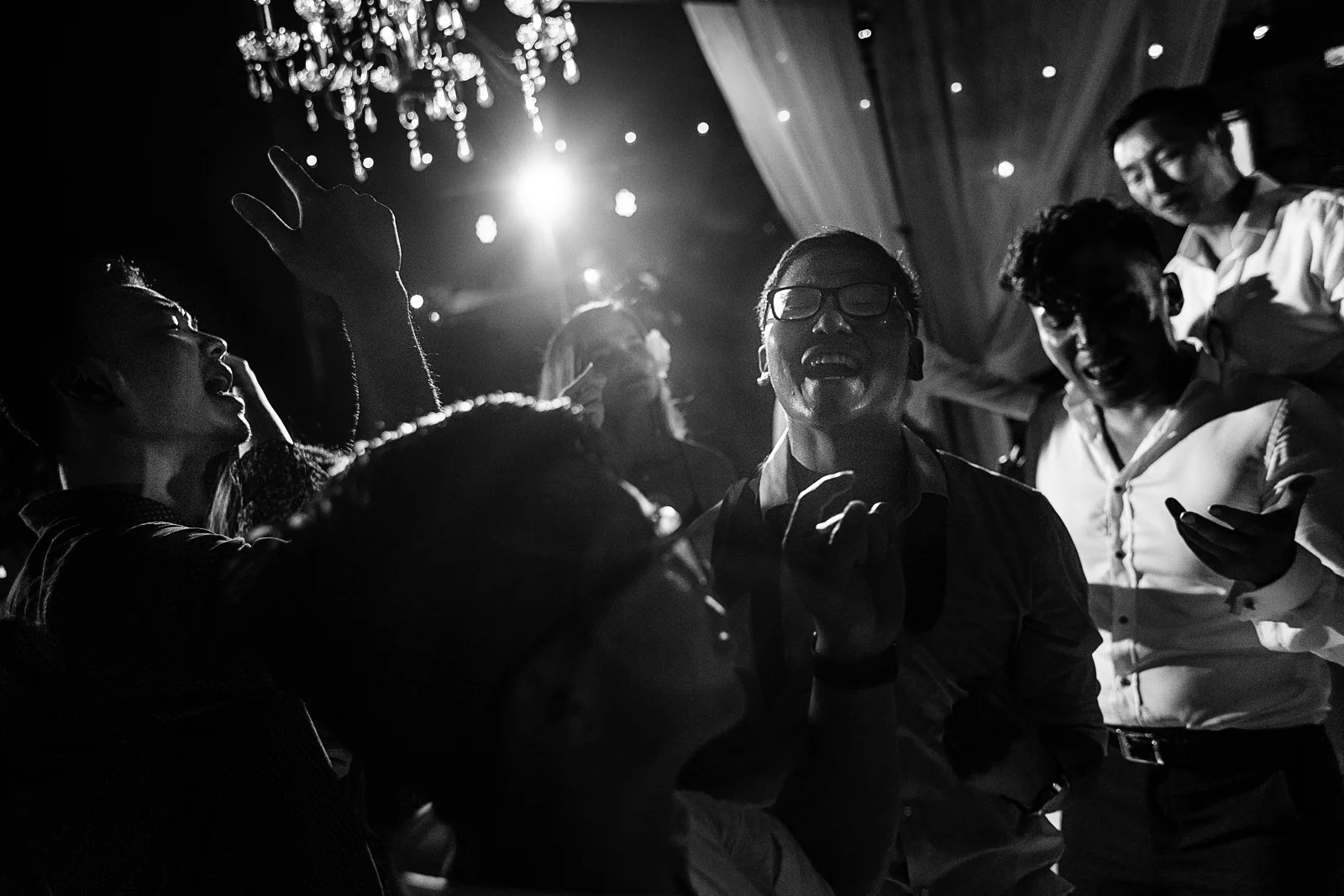 Wedding guests having the time of their lives on the dance floor at a wedding in Martoca Beach Garden.