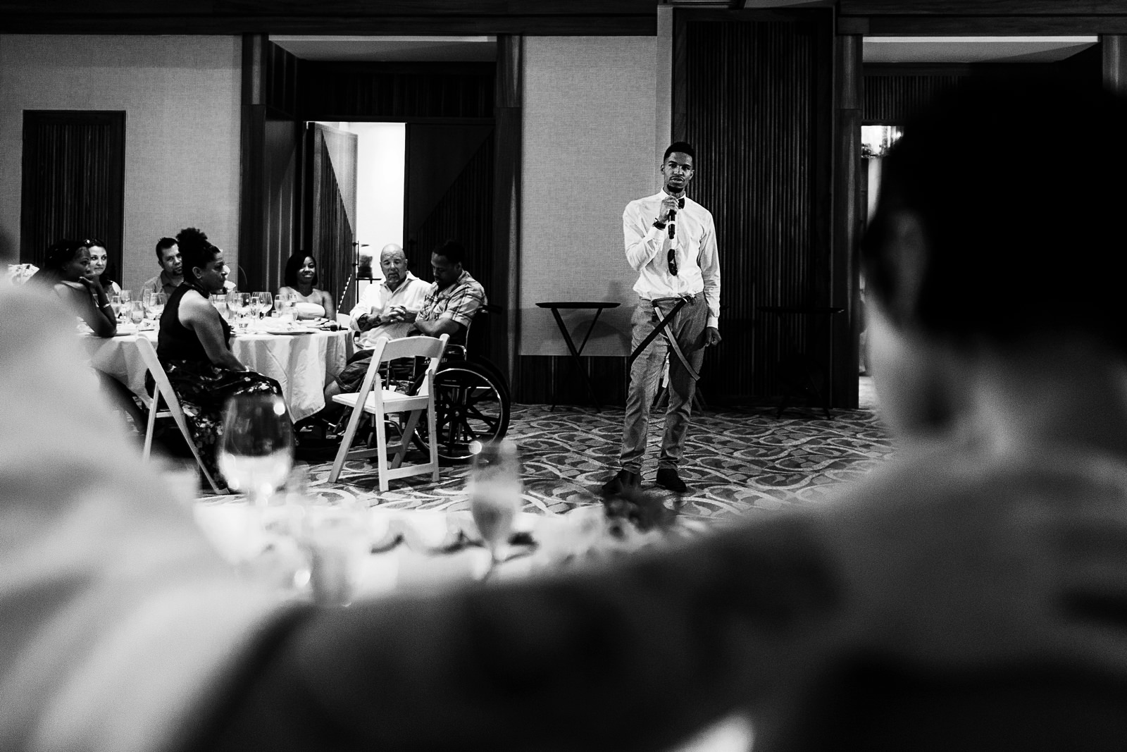 Young man giving a speech to the wedding couple in the ballroom of Hyatt Ziva resort