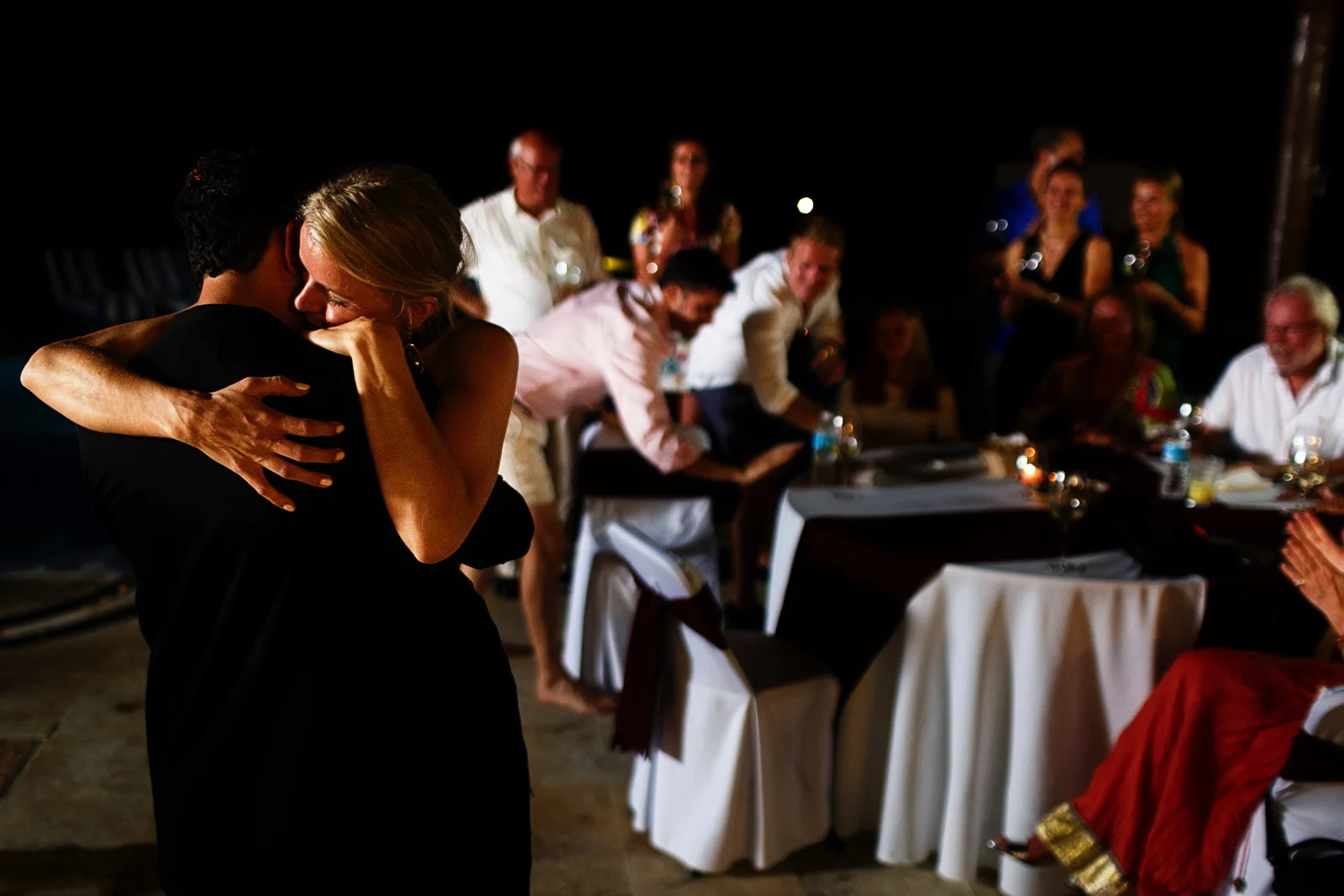 Bride hugs groom after his speech