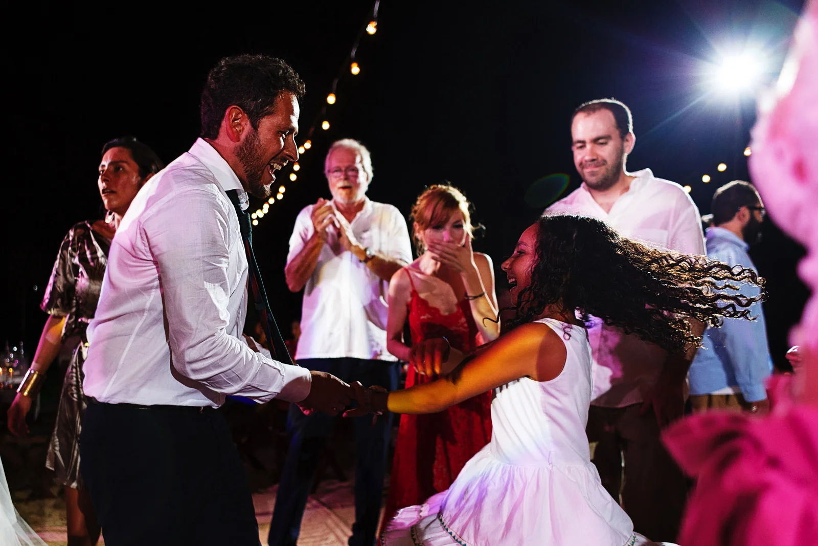 Groom dances with a young girl