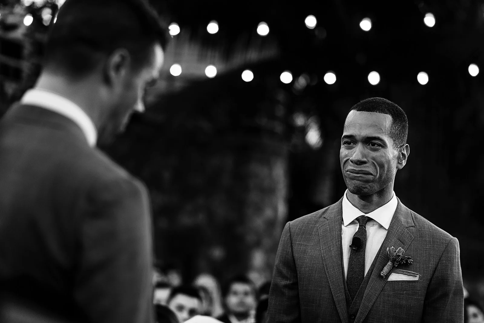 Groom crying at vows exchange