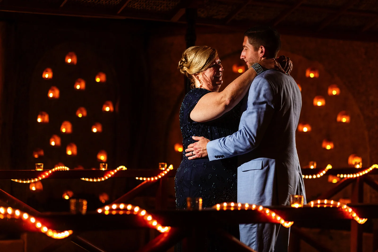 Groom and mother dancing