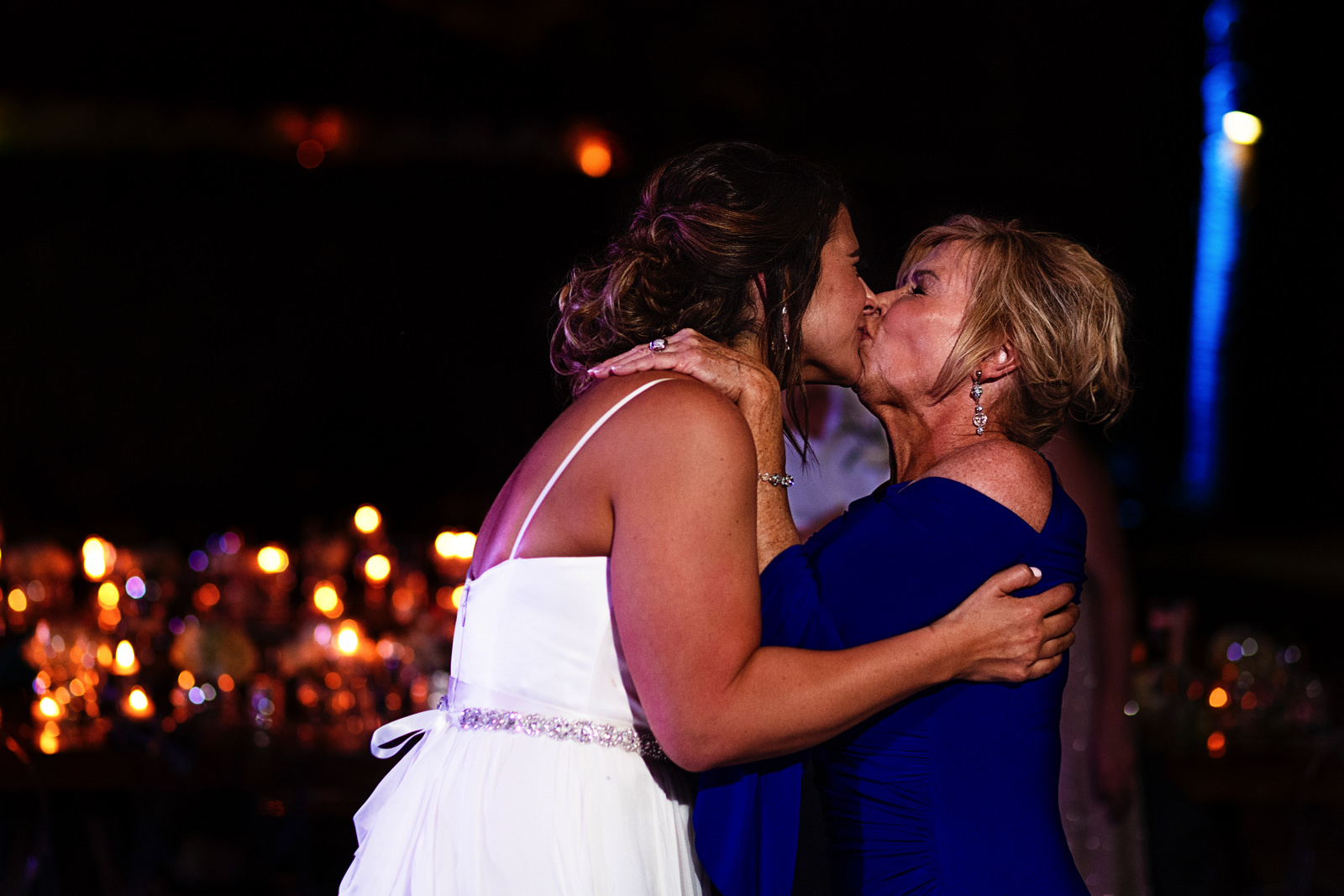 Mother of the bride kiss her with all of her strength