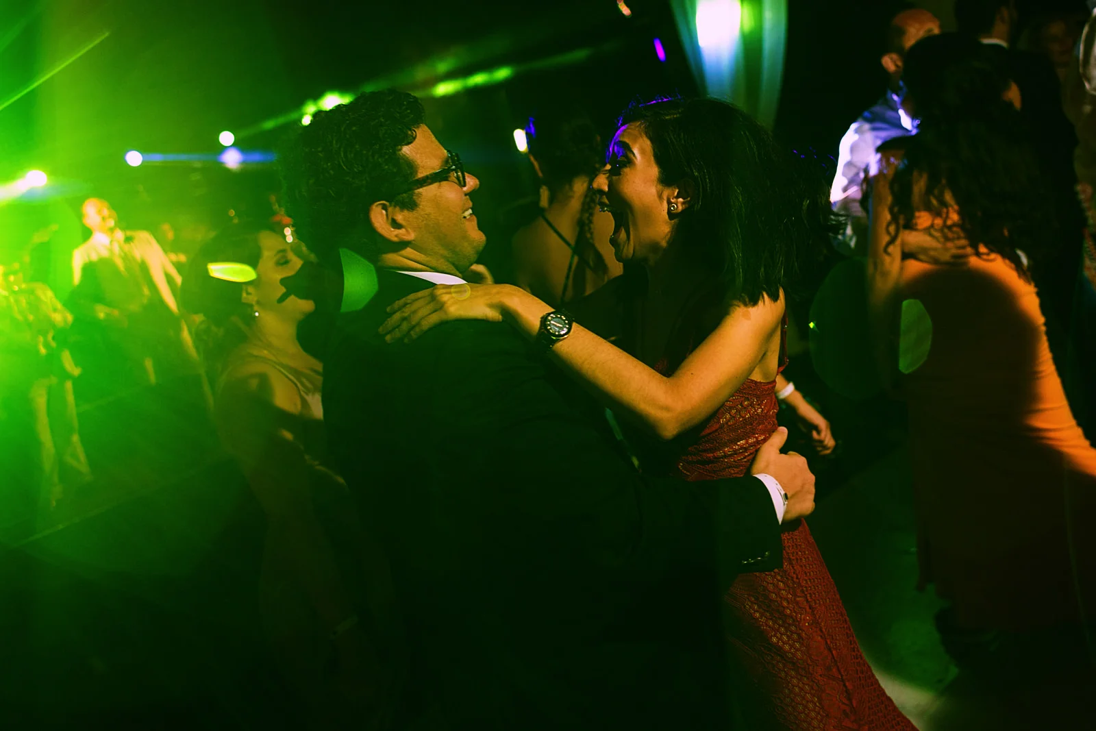 Wedding guests having a great time at the party