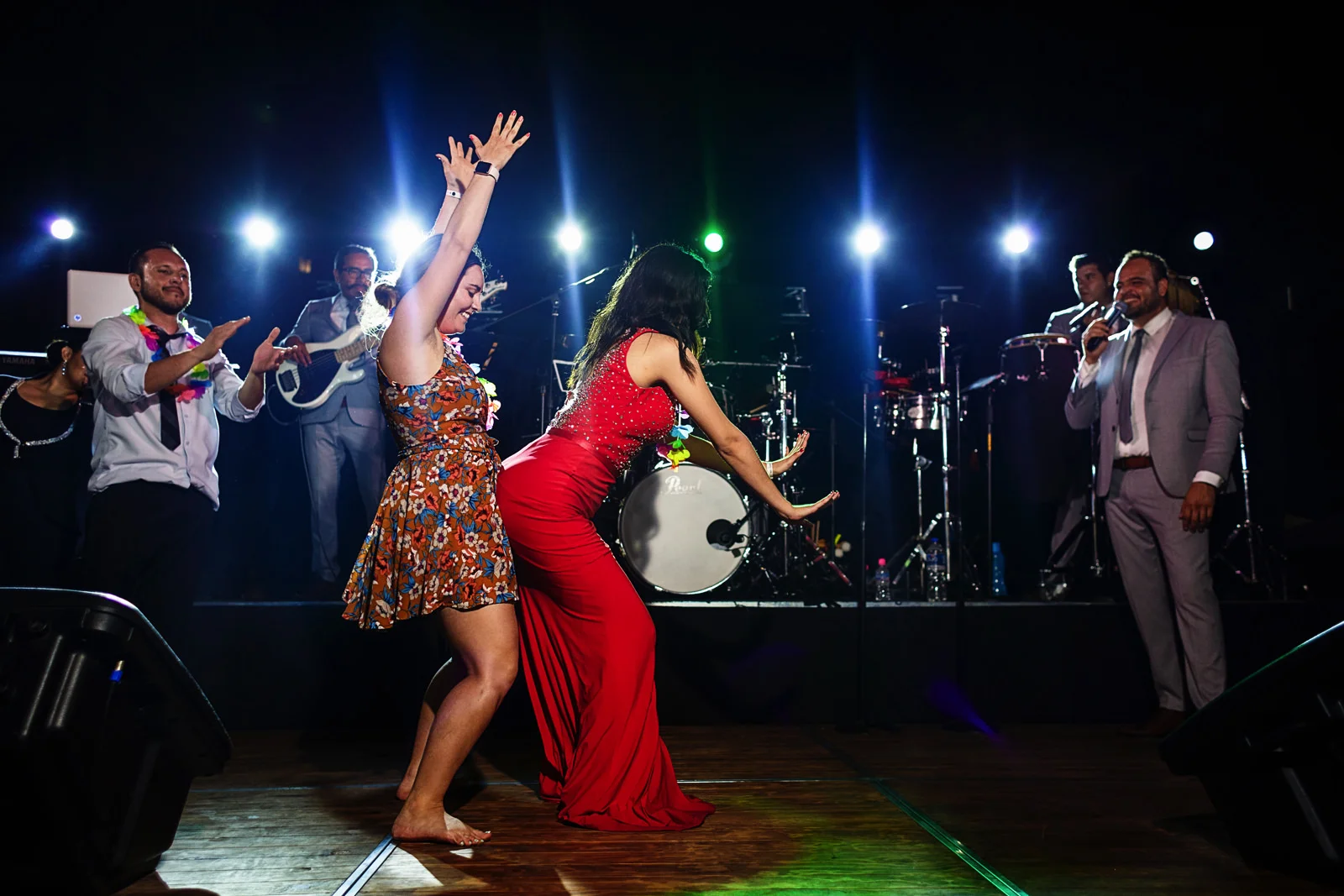Girls dancing on stage for the music band contest