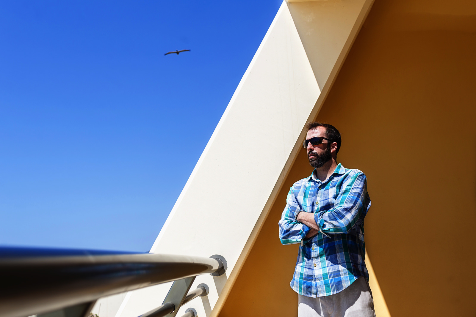Groom creative portrait at Iberostar Punta Mita room’s balcony