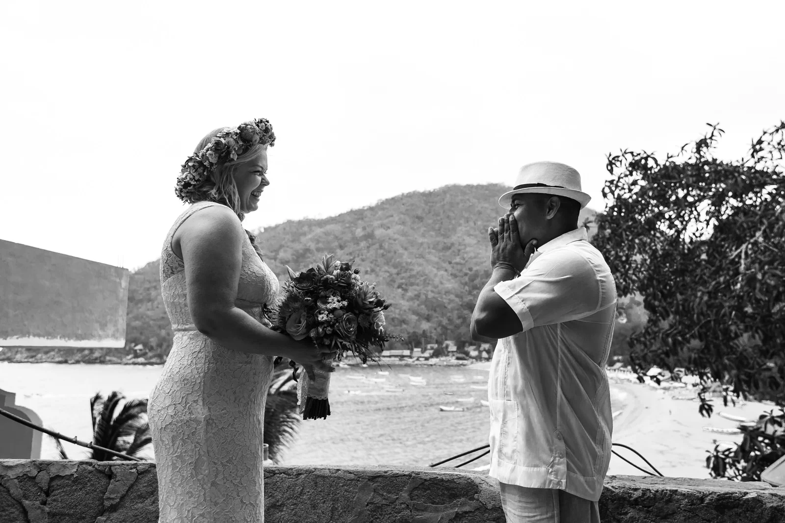 Groom reaction to seeing his bride for the first time all ready to go to the wedding ceremony.
