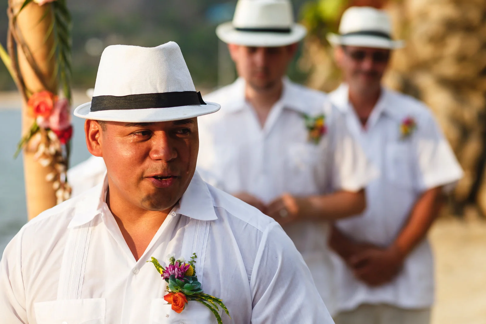 Groom crying while reciting his vows during the wedding ceremony.