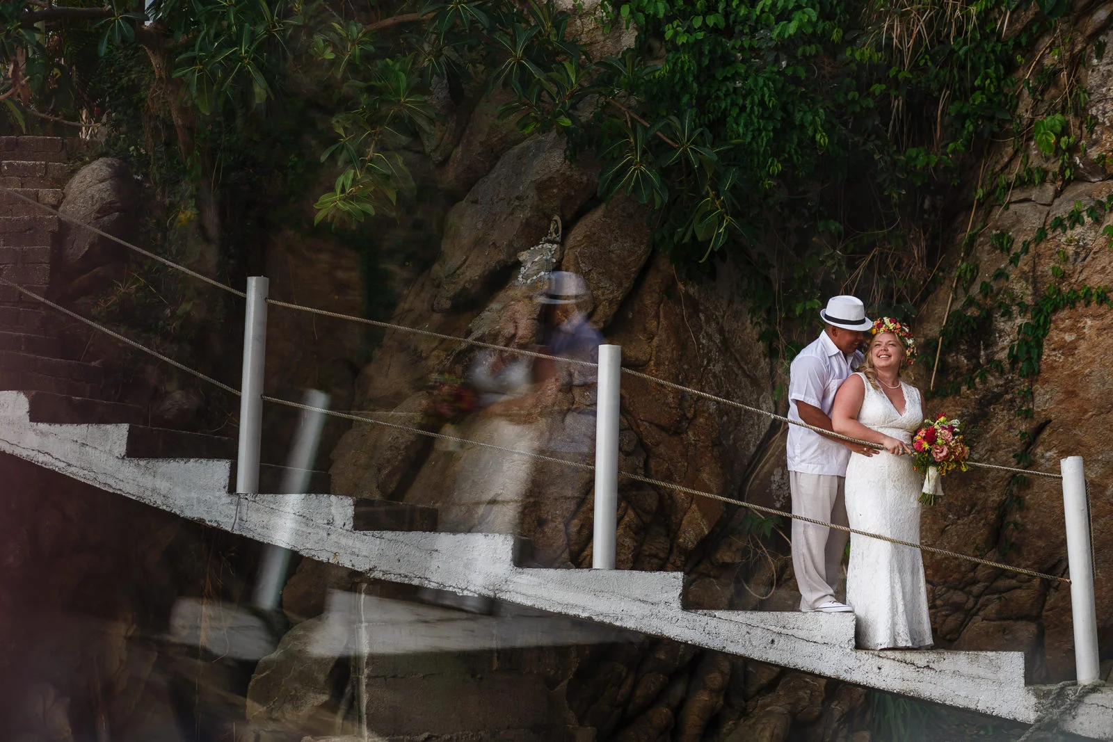 Groom and bride portrait on the staircase of Miramar Yelapa that takes you down to the beach.