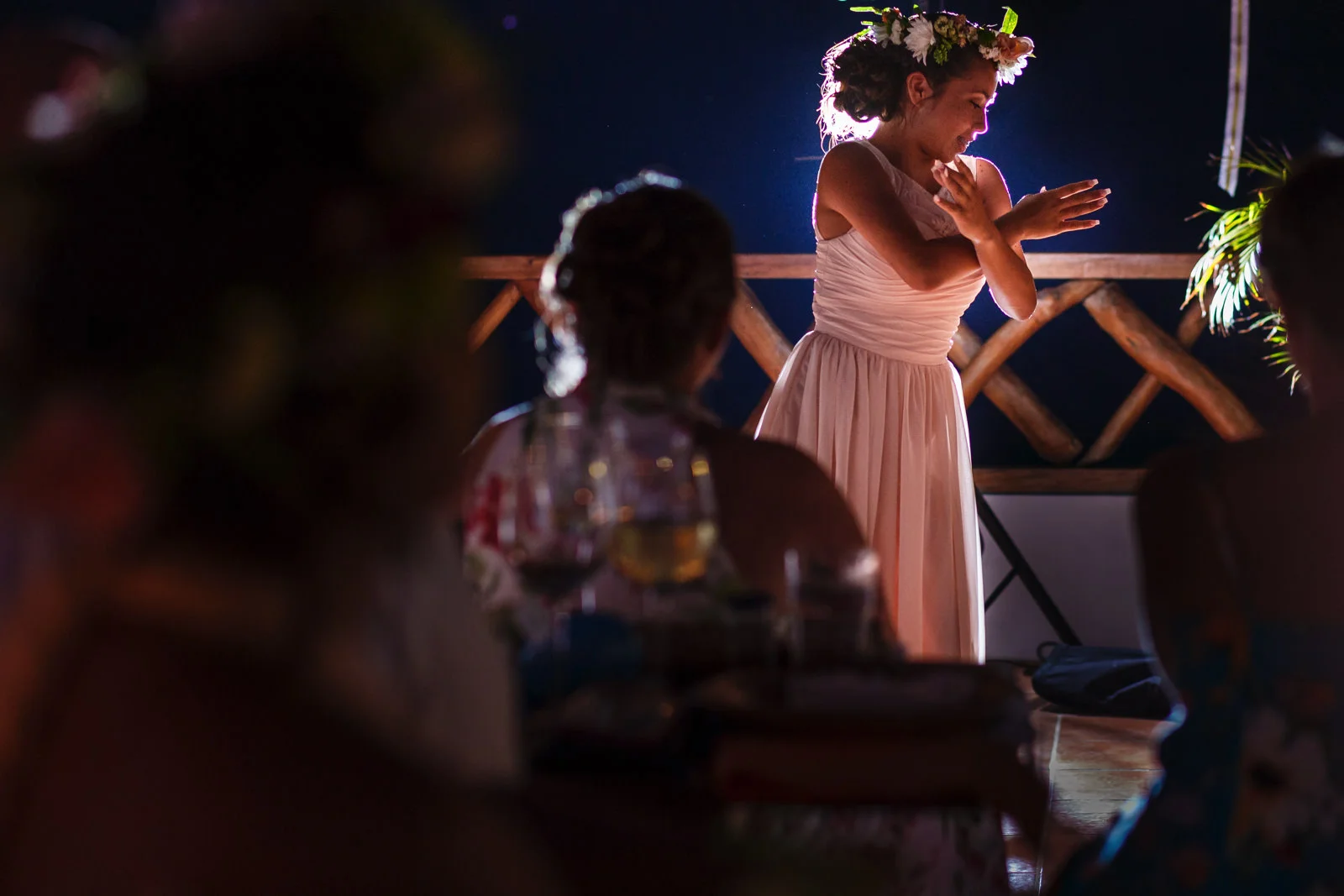 Bridesmaid/daughter performing a dance during the wedding dinner.