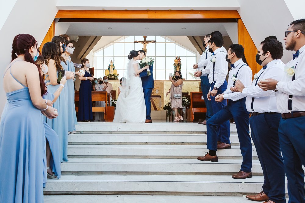 Bride and groom kiss at the end of their wedding ceremony at Canto del Sol’s chapel