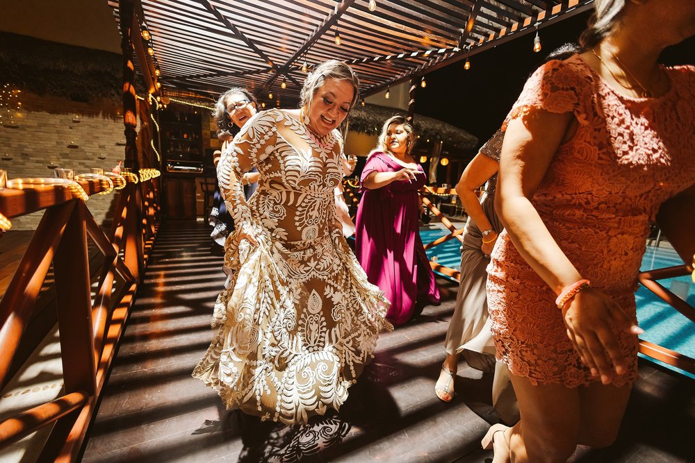 Bride and wedding guests enjoying the party and the dance floor