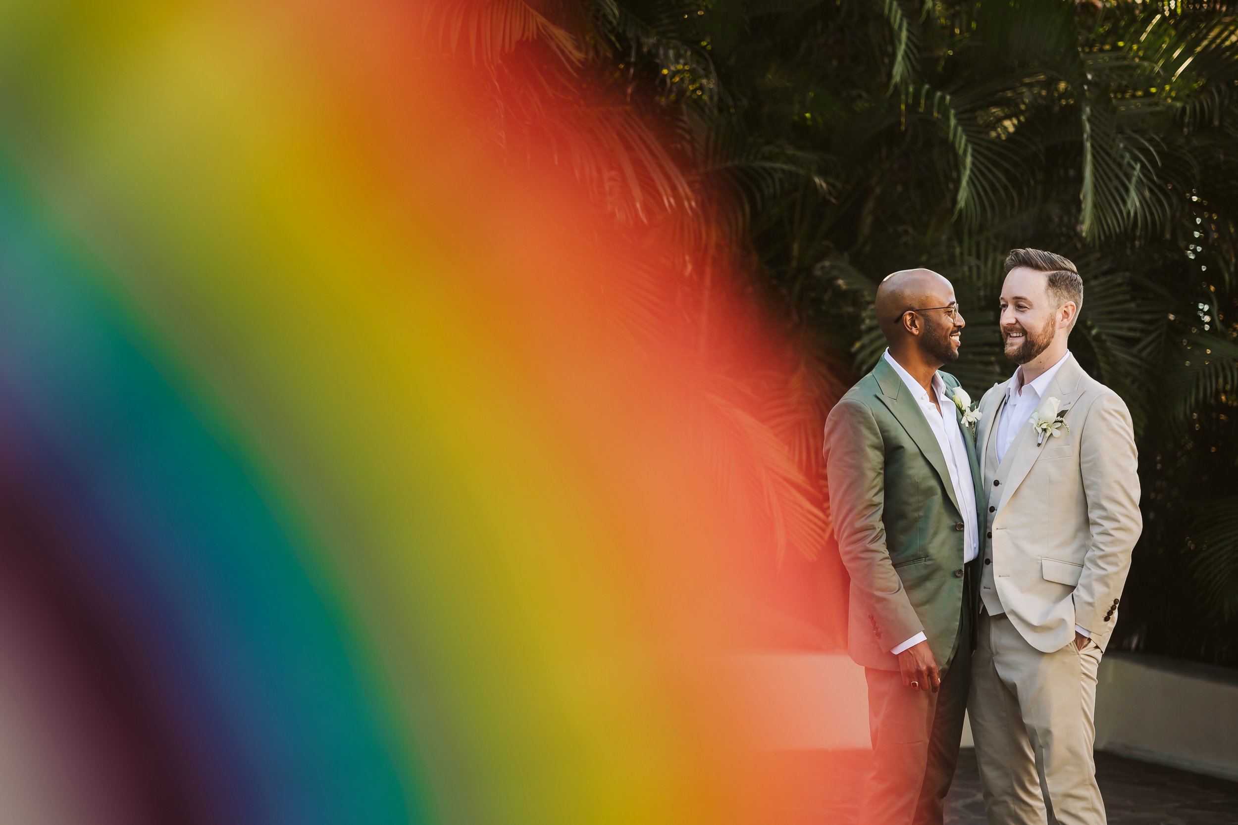 LGBT-couple-rainbow-colors-fabric-fan-hotel-playa-fiesta-puerto-vallarta.JPG