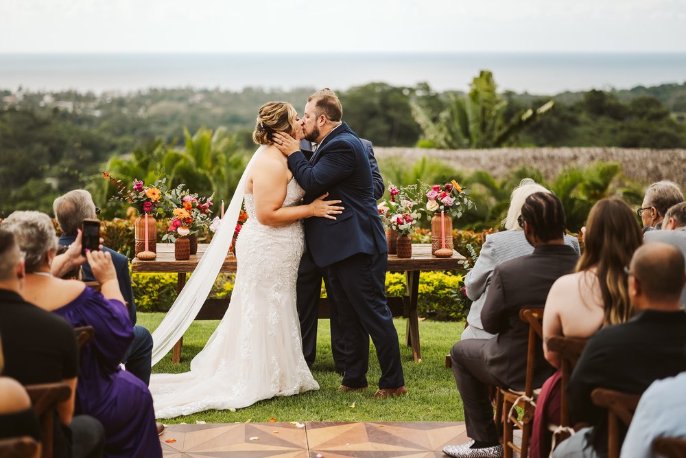 Bride and groom’s first kiss during their wedding ceremony at Hacienda Antigua, in Lo De Marcos, NAY.