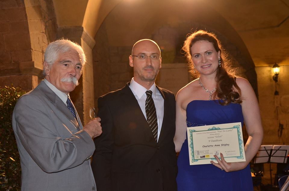 Charlotte-Anne receiving her Third Prize certificate from Maestro Antonio Bellandi and Maestro Egidio Saracino