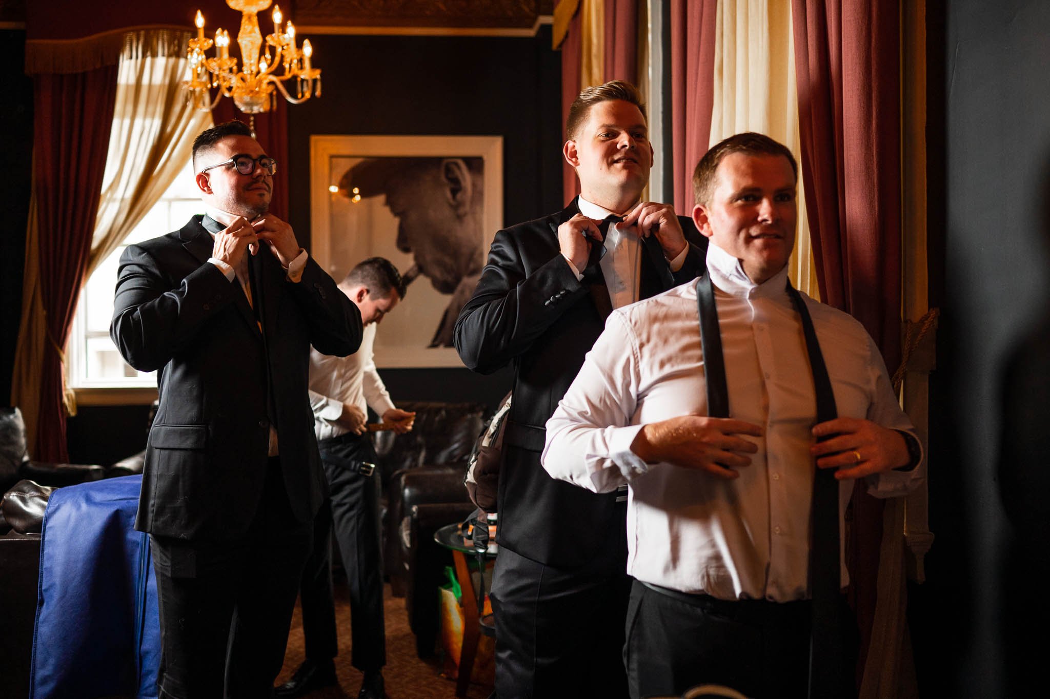 Groomsmen getting ready in the Cigar Lounge at the Halifax Club