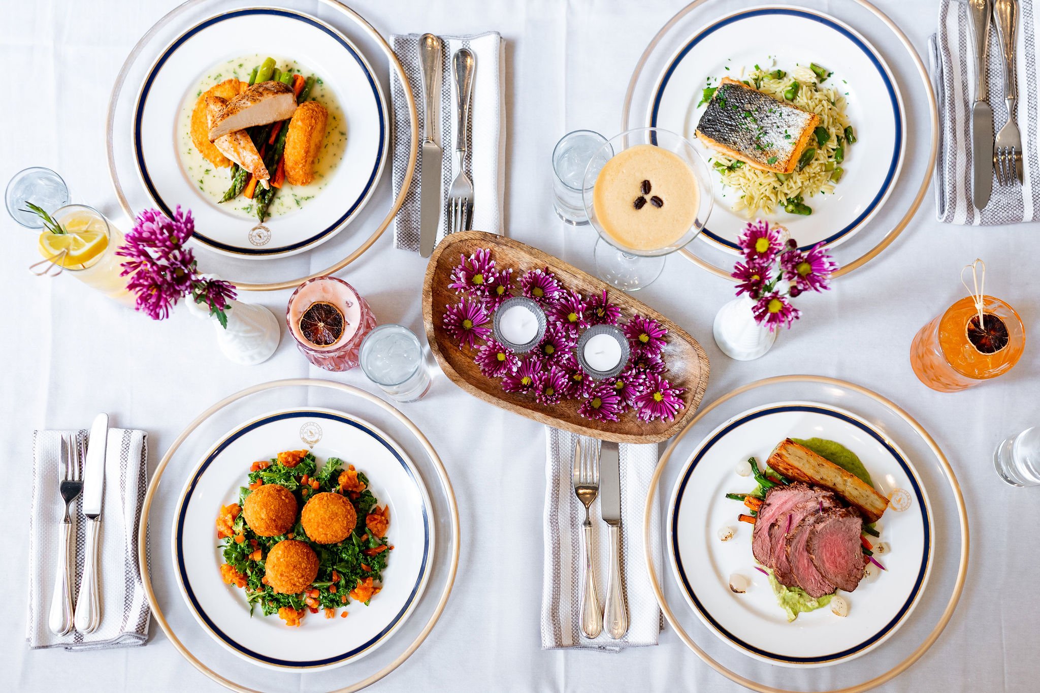 overhead table presentation of 4 plated meals at the halifax club