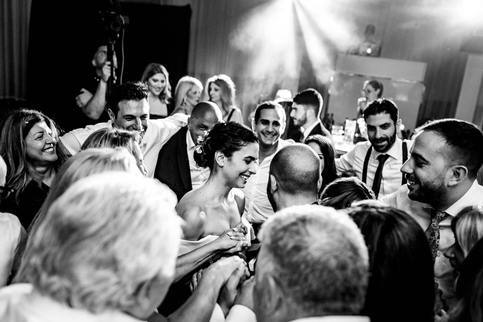 black and white photo on a packed dancefloor