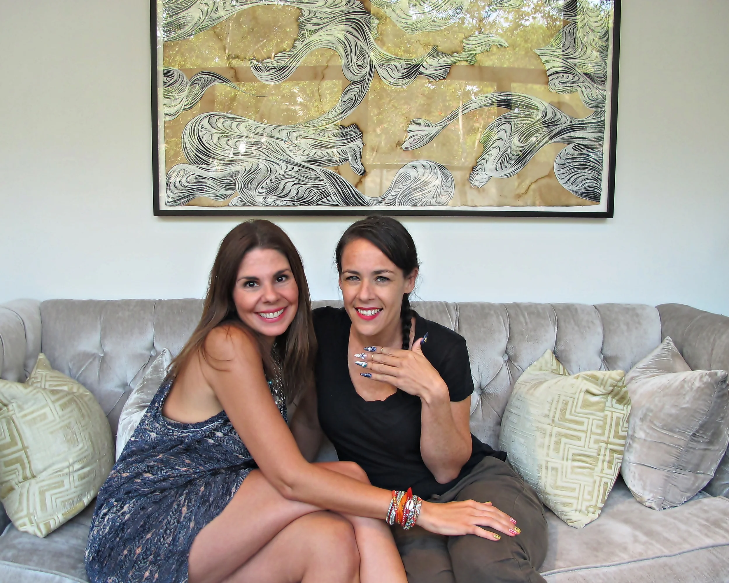Rita de Alencar Pinto, the owner and curator of Vanity Projects, and I in her office with a David Ellis piece on the background