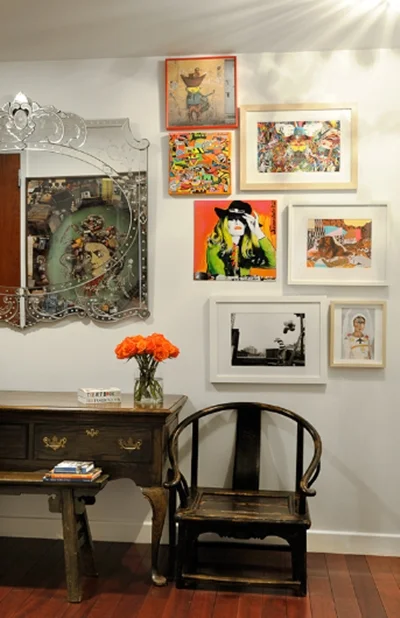 A Vik Muniz piece "Medusa After Caravaggio" from the "junk" series reflects on the mirror. The junk of this series was in many cases collected by the pickers of Jardin Gramacho in Rio or gotten straight from junkyards close to the favelas. 