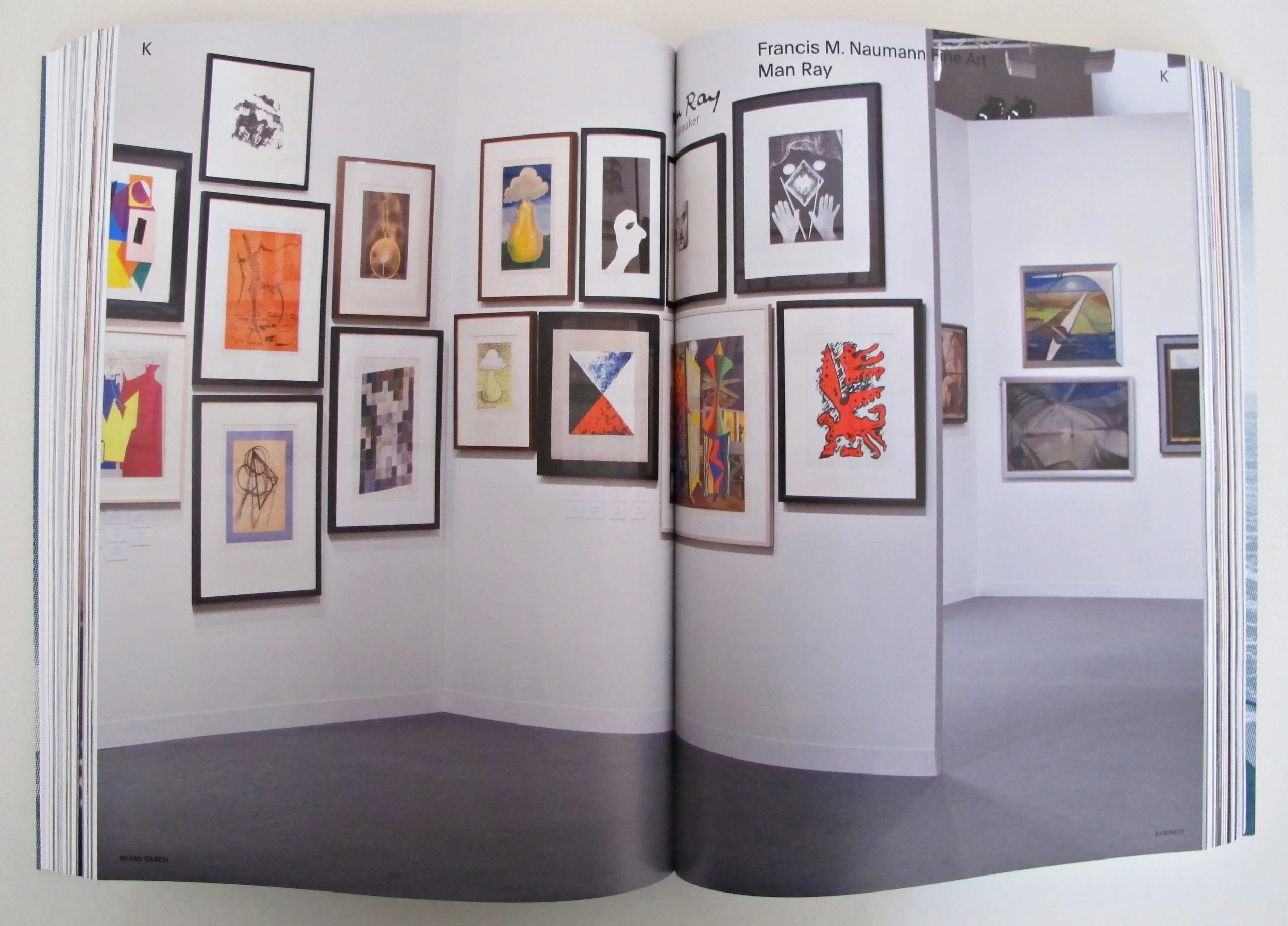 The booth of Francis M. Naumann in Miami showcasing Man Ray's pieces in 2013
