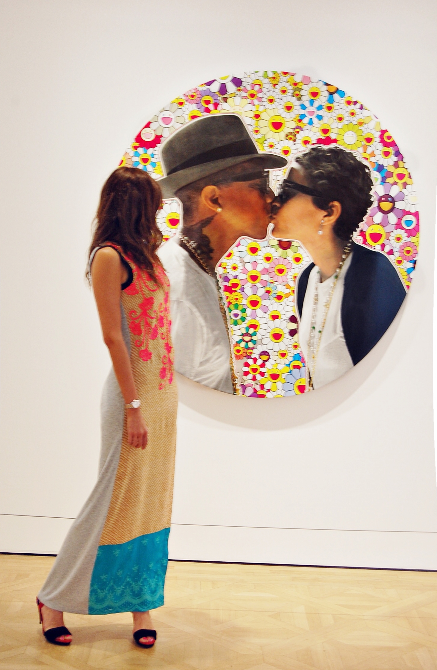 Another Takashi Murakami piece using Pharrel and Helen's portraits superimposed on top of his characteristic flowers.