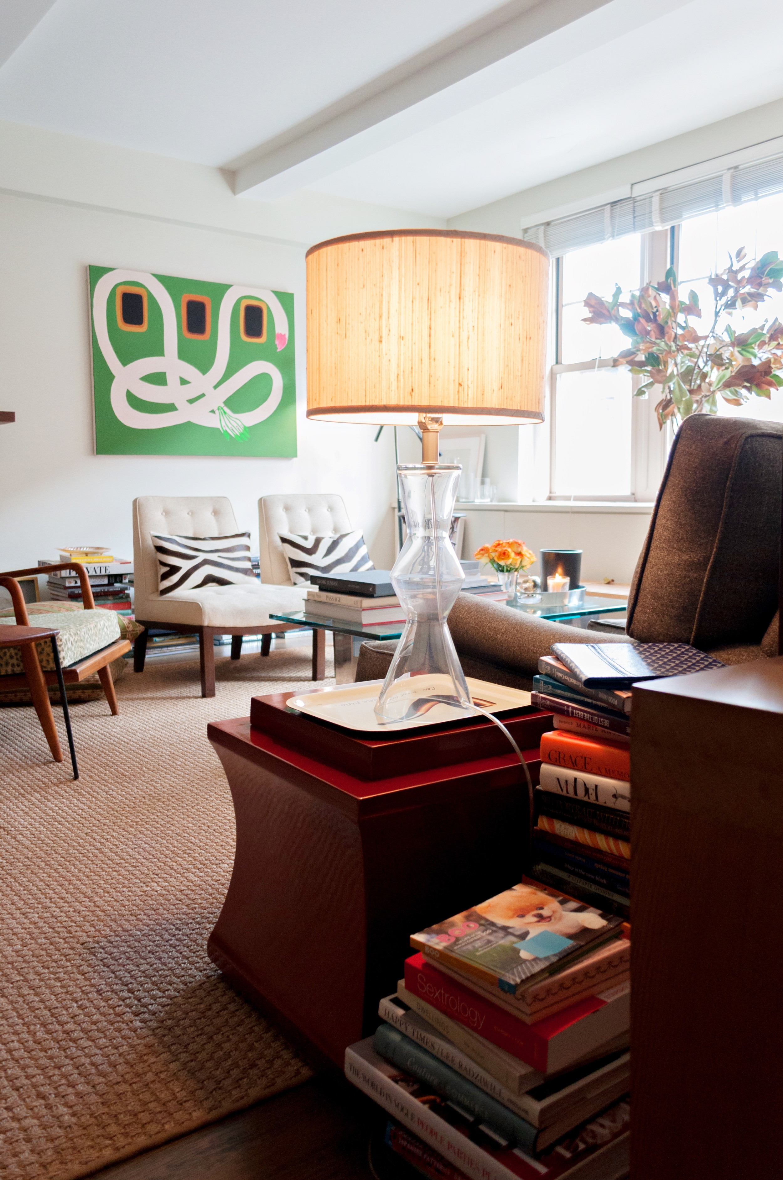 Mia Enell's abstract canvas is such a focal point on that wall. The piece is called "The Gardening Arm"