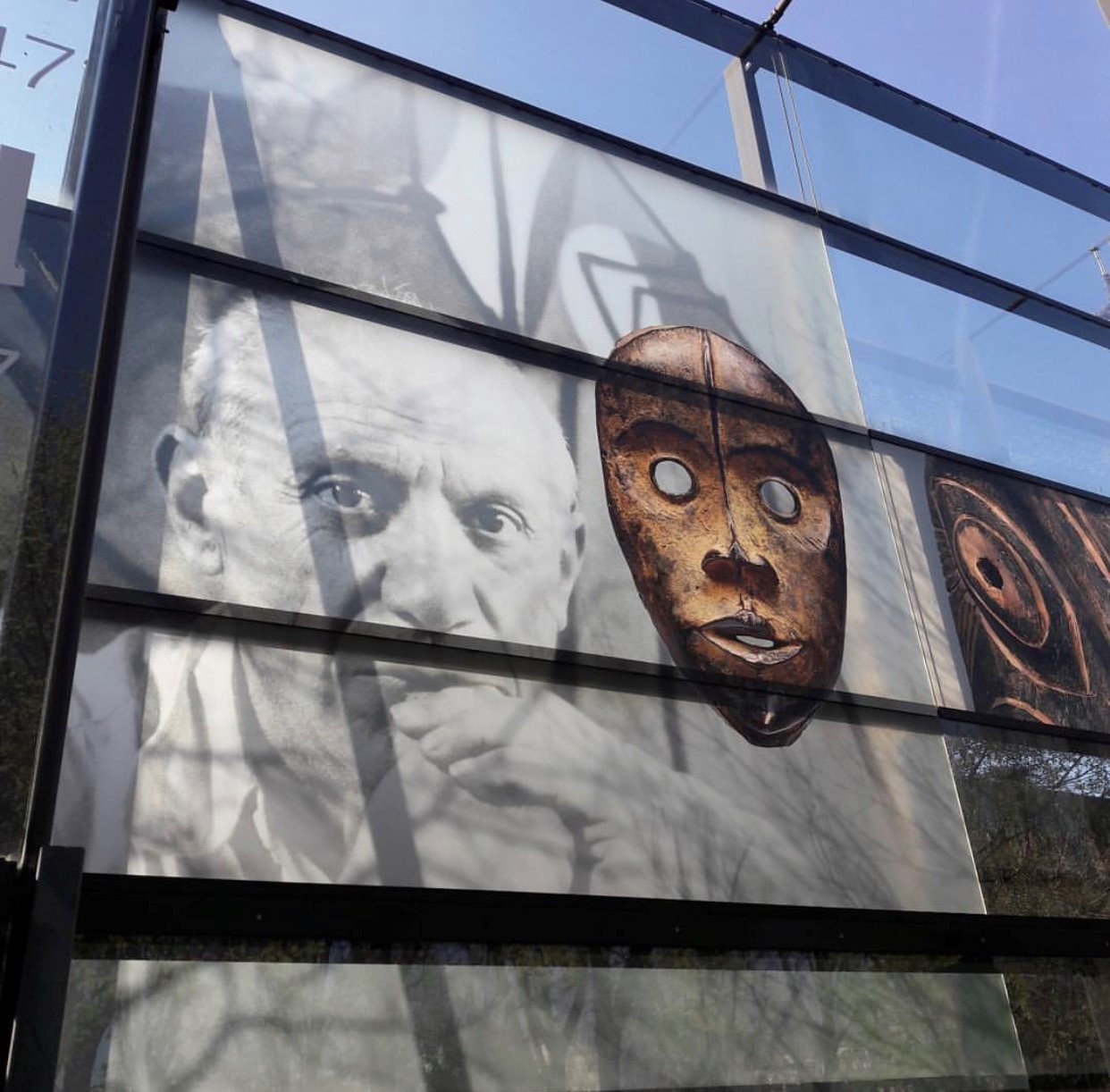 The external glass wall of the museum. Picasso's portrait is by Herbert List.