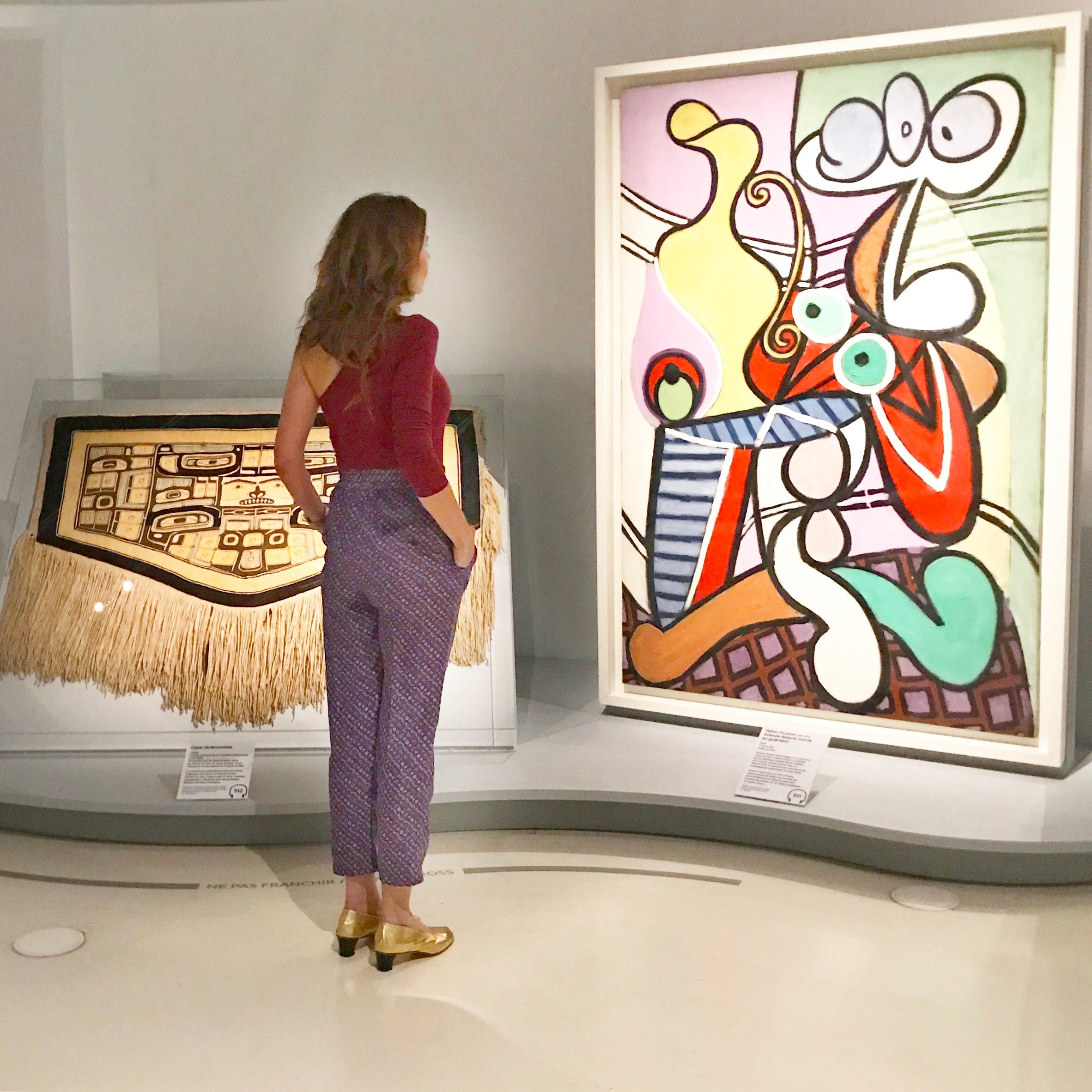 1800s ceremonial Chilkat cape next to Pablo Picasso's G rande Nature Morte au Gueridon, 1931 .
