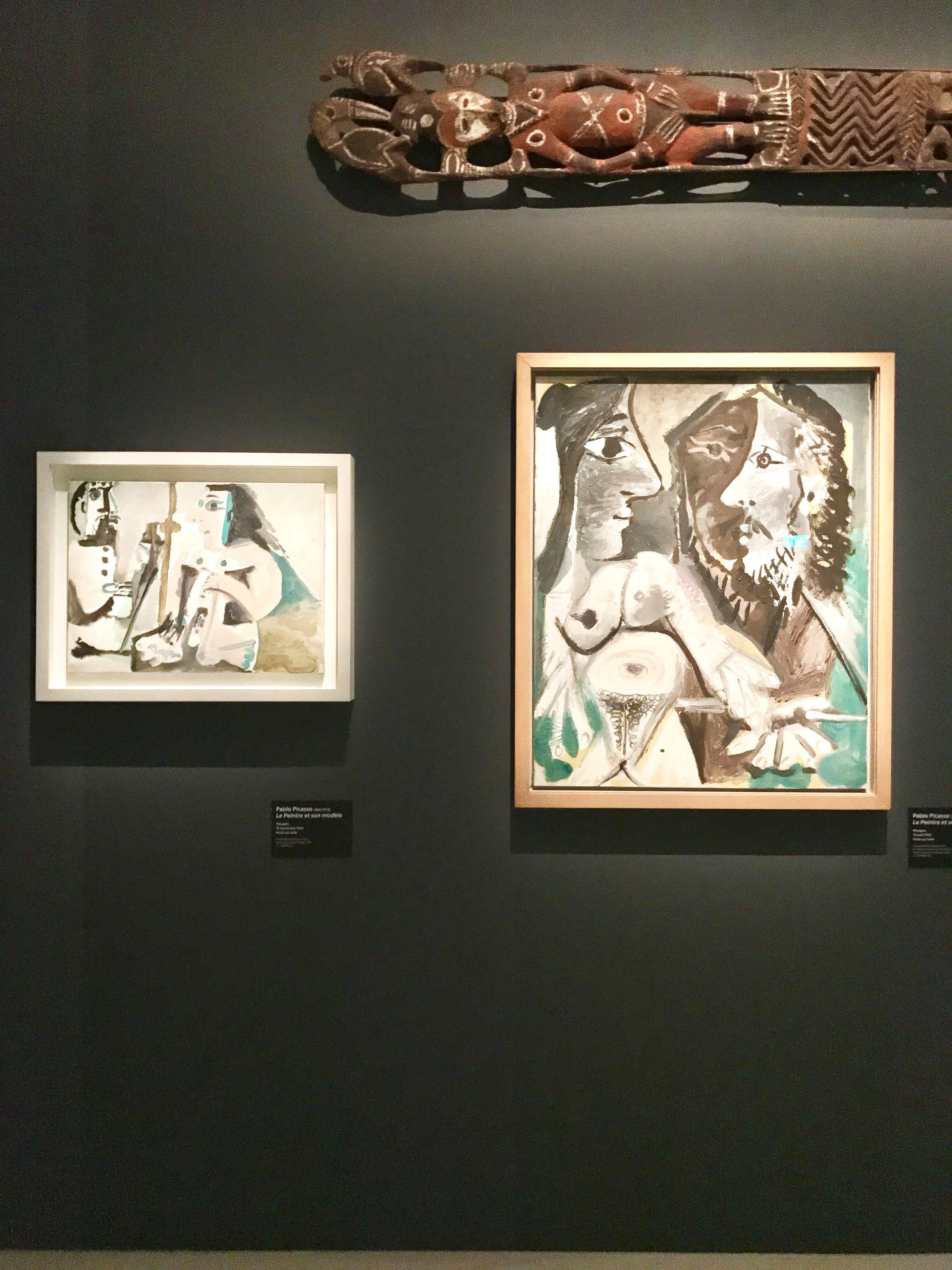 Pablo Picasso , Le Peintre et son Modèle, 1964 ; Pablo Picasso , Le Peintre et son Modèle, 1967 and a New Guinea wood lintel from the beginning of the 20th Century above.
