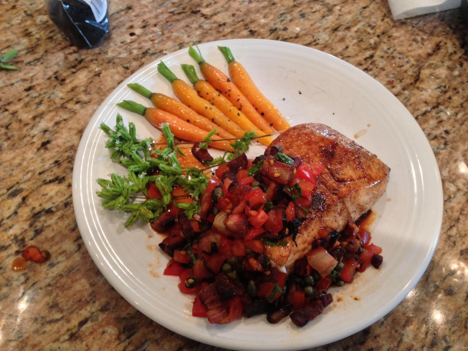 Sea bass with pancetta, baby sautéed carrots