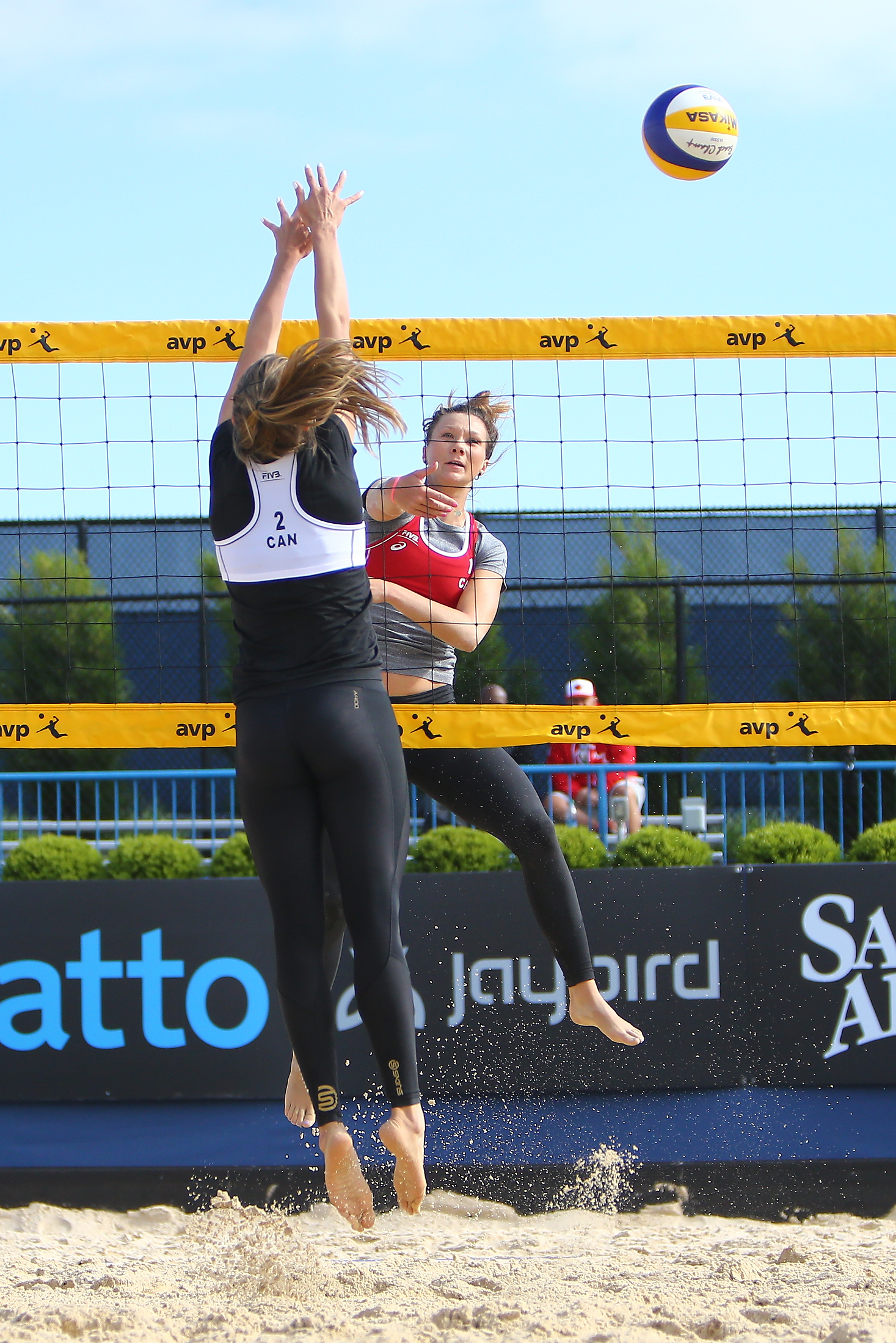 Julie Gordon hits around Taylor Pischke this morning. Picture: FIVB