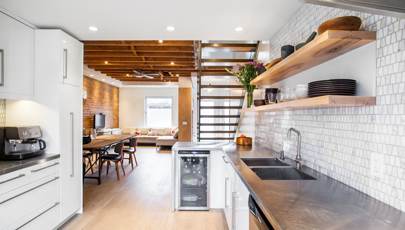 The client's desire for a kitchen that 'felt like a machine' informed the selection of robust, commercial-grade finishes, hardware and fixtures. 