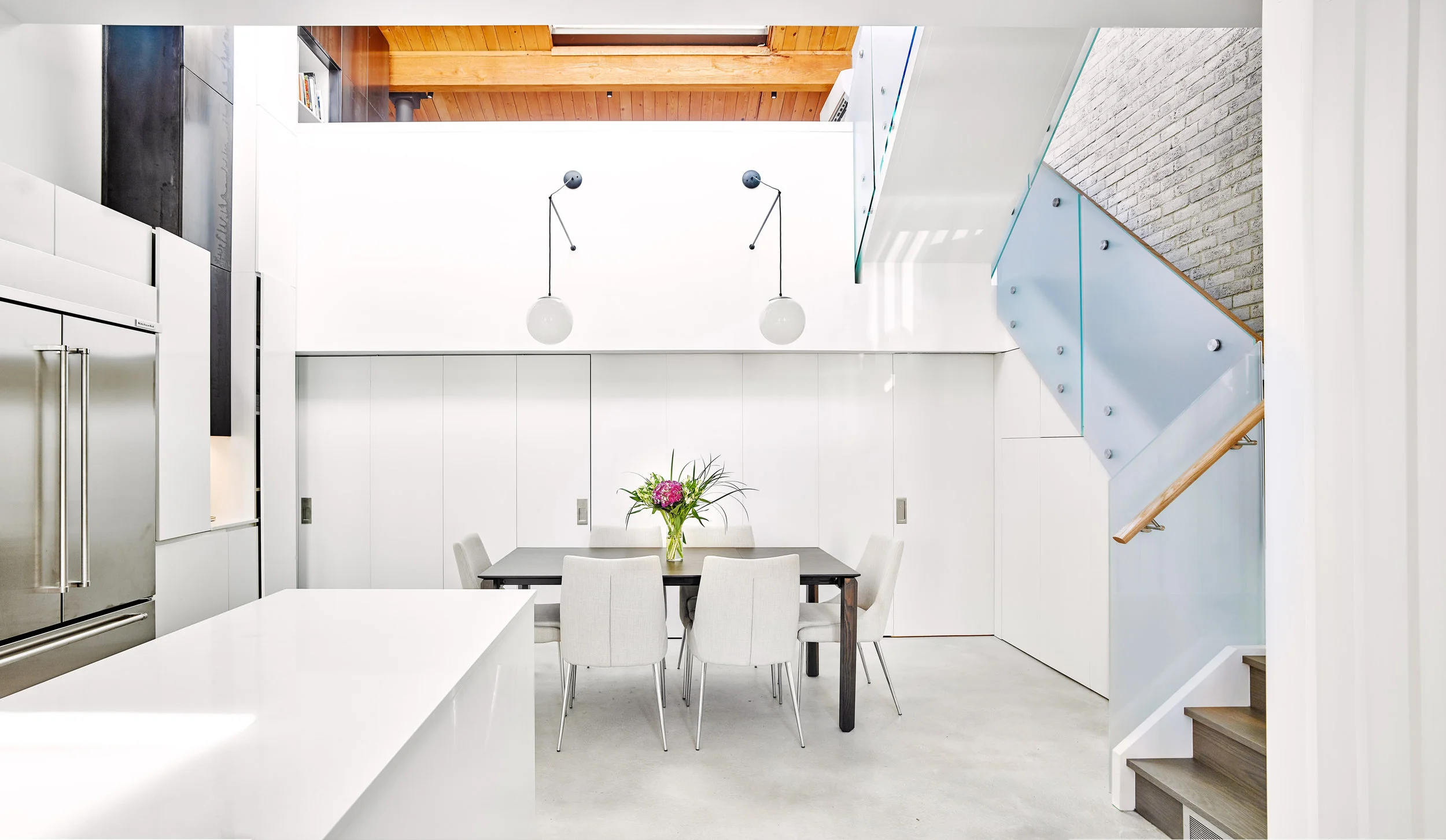 When the bedroom bifold doors and the powder room pocket door are closed, they all align perfectly to close off the private zones of the house from the common spaces of the ground floor.