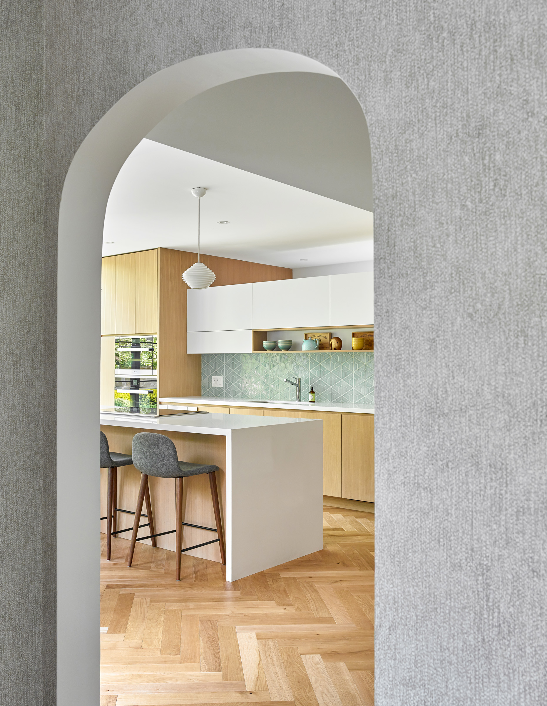 The project establishes a dialogue between the old home and the new addition; views are carefully framed from one to the other to create linkages between spaces.
