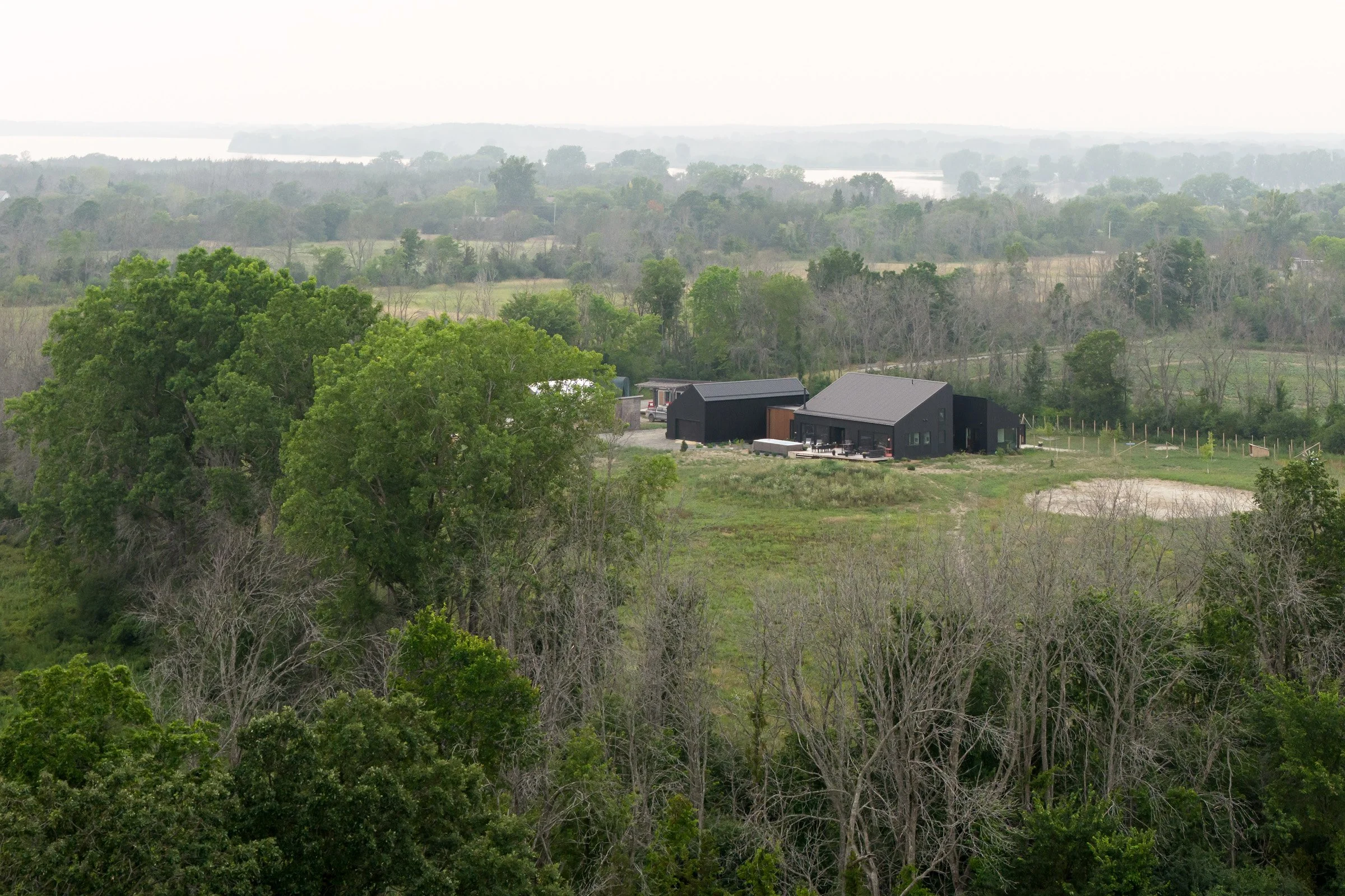  Carefully sited in one of several large fields that make up the property, the home was oriented to prioritize views and natural light. 