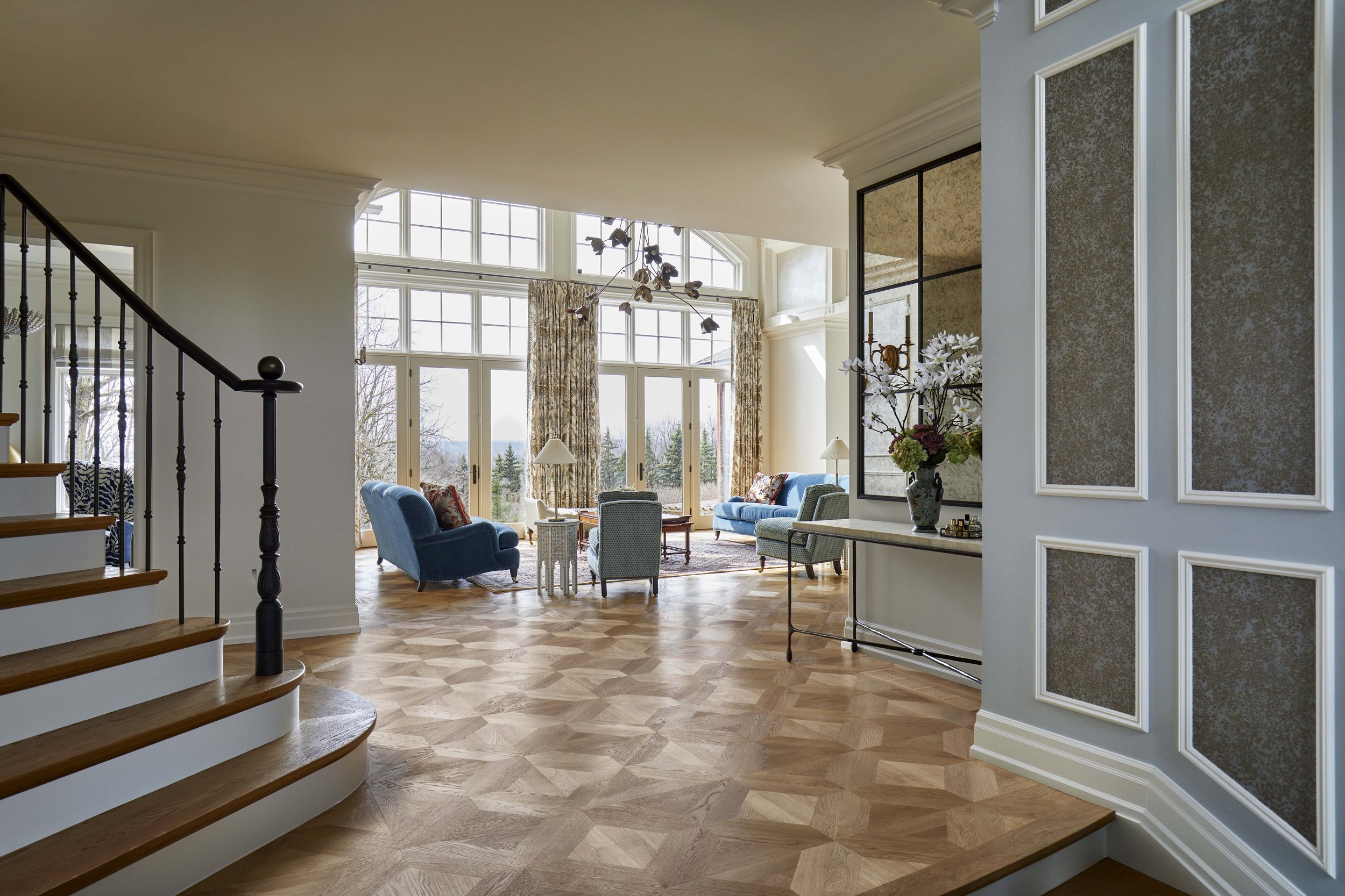  The foyer is a gracious introduction to the home, with a view out to the living room and outdoors beyond. 