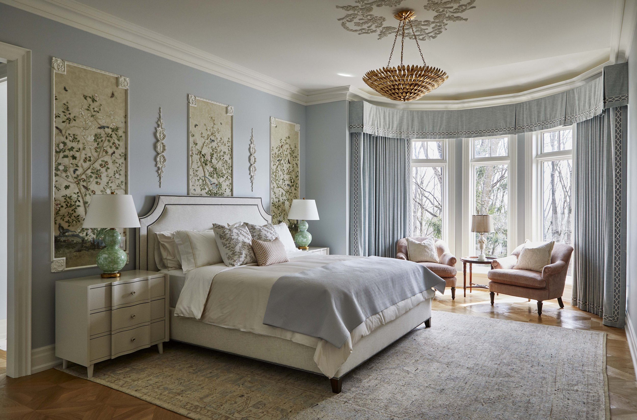  The spacious primary suite is located on the ground floor as well. A suite of rooms was reconfigured to increase the size of the bedroom, and create a new dressing room and revamped ensuite. In the bedroom, new plasterwork references traditional Fre