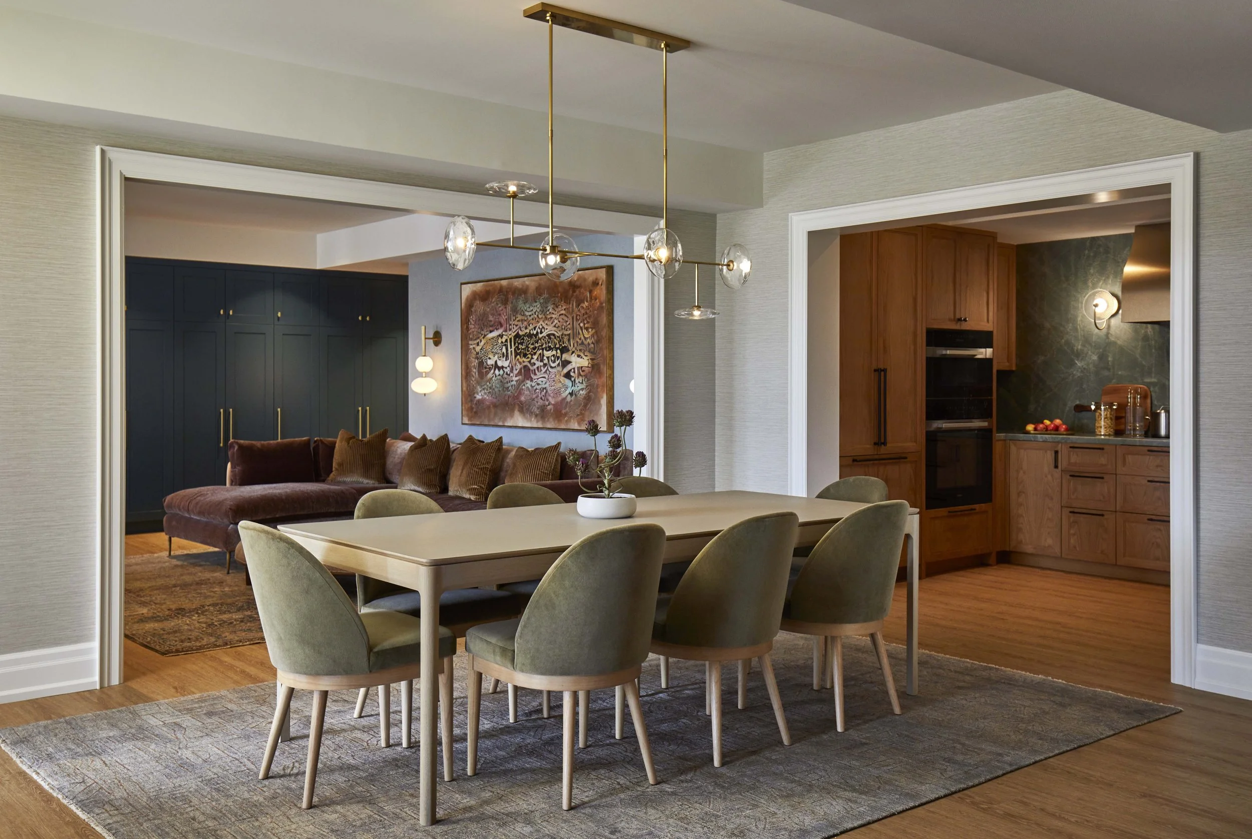  The basement dining area provides space for the whole family to gather, and is centrally located between the kids play area, kitchen, and TV area. 