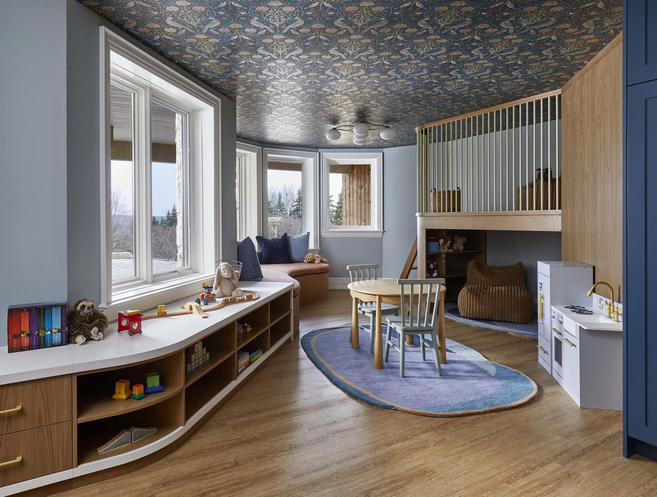  The kids play area and lounge is a colourful, fun space designed for children to have free reign. A comfy sofa is located in lounge right next to the play area for the family to curl up and read together, or rest. 