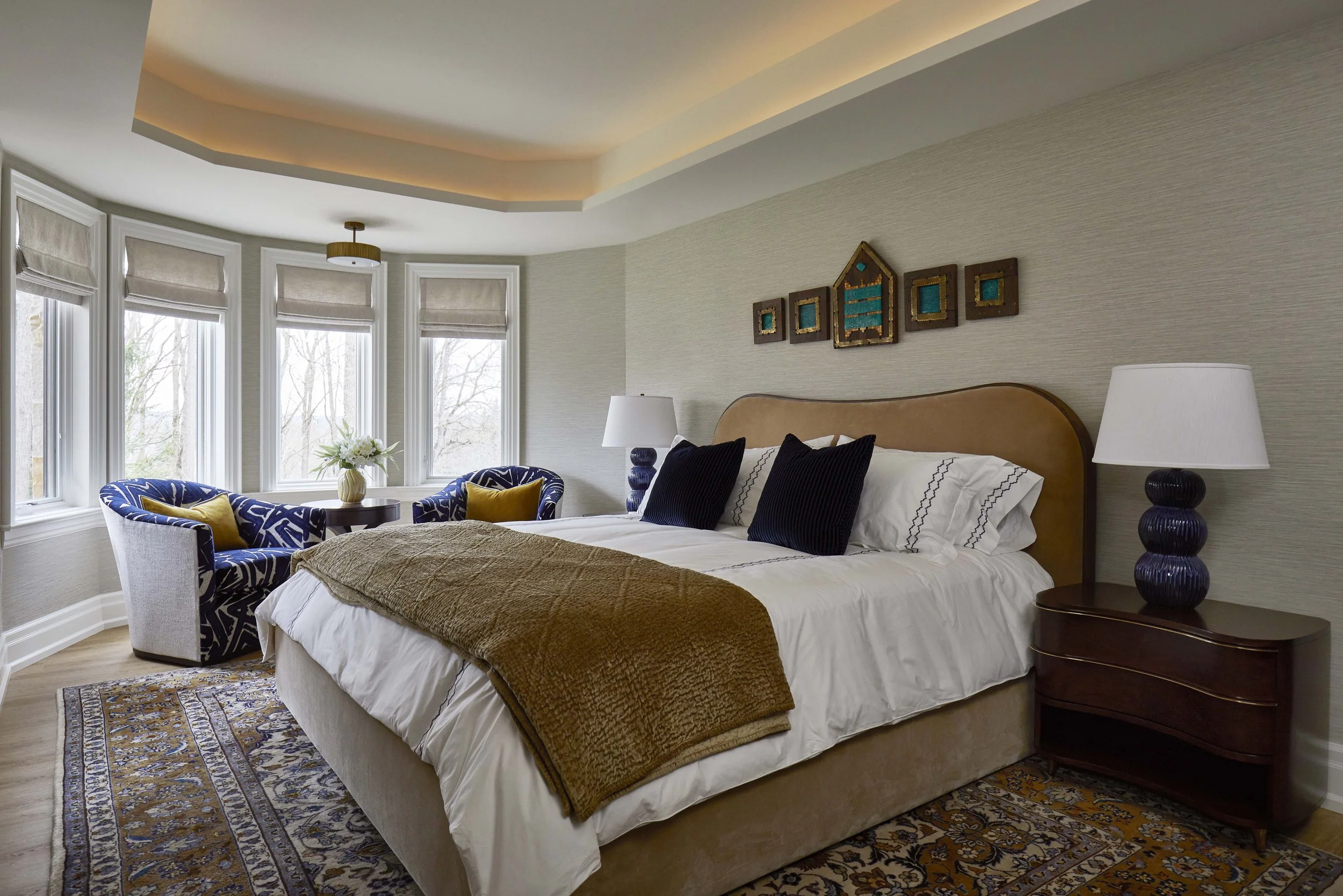  The client’s mother lives with them and it was important to create her own suite of rooms within the house, including a large bedroom, ensuite, and art studio. All three rooms have a mix of contemporary design elements with traditional motifs, and f