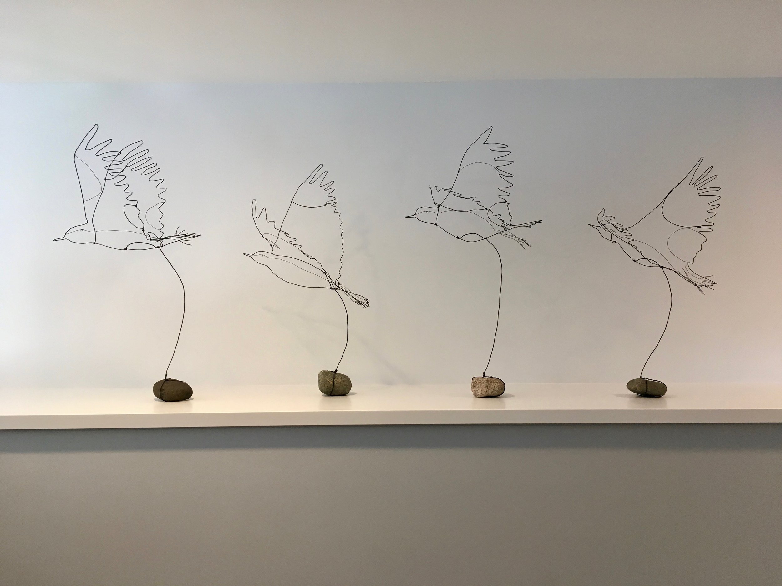 Wire Birds with rock