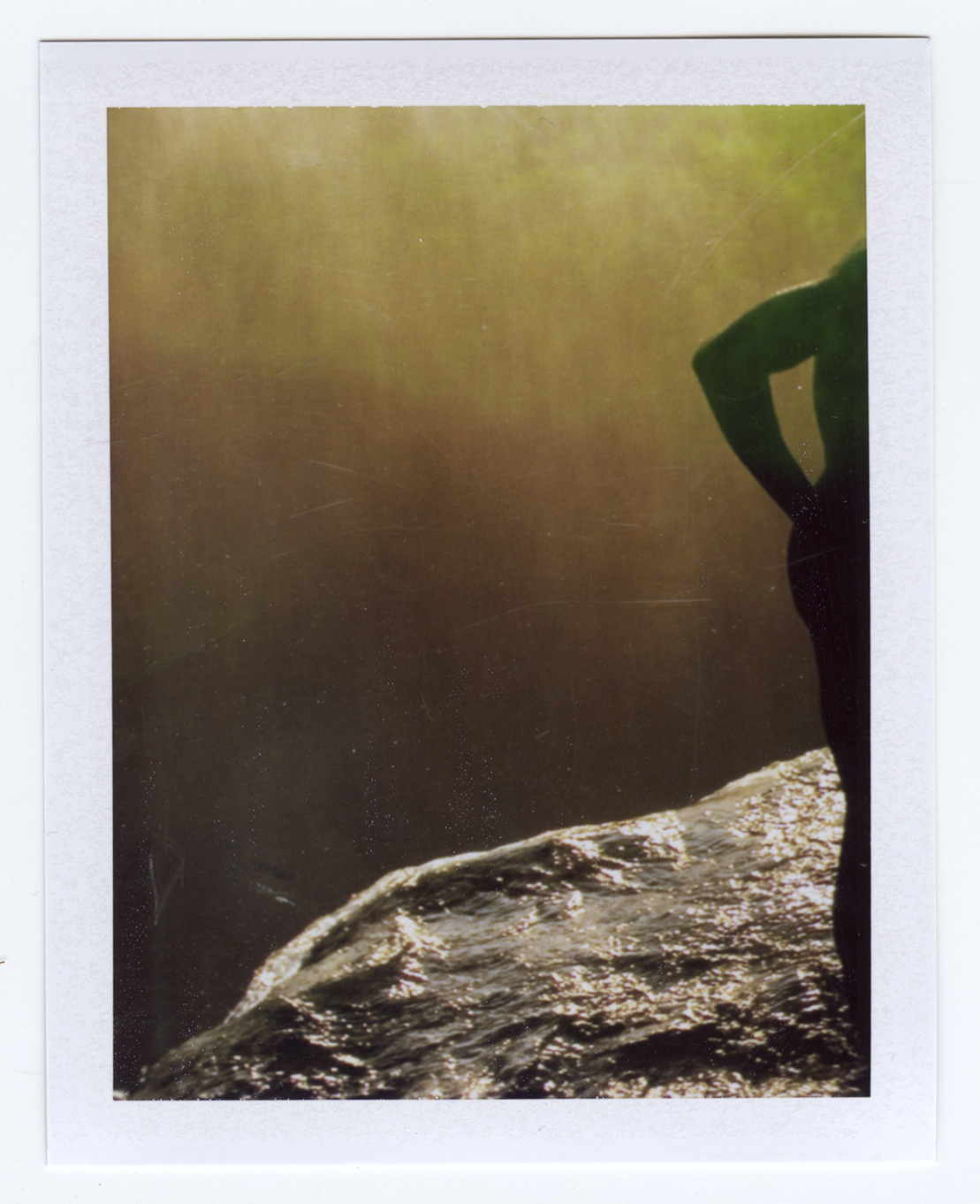   still in the flood waters  Polaroid of found National Geographic, 2015   Statement + Info  