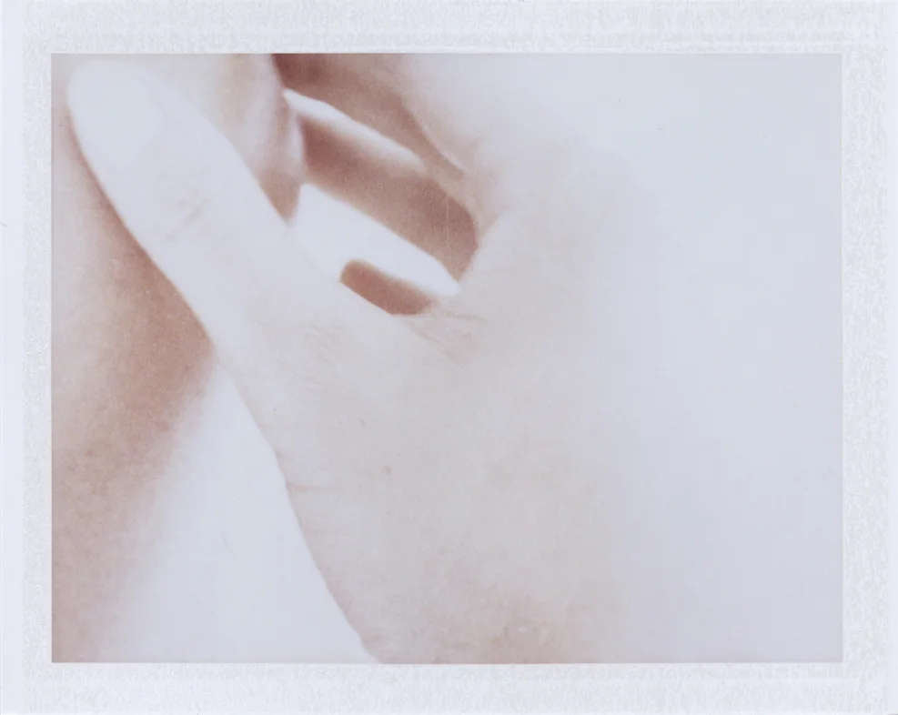 A slowly loosening grip Instant film photograph, 2013 Info + Statement